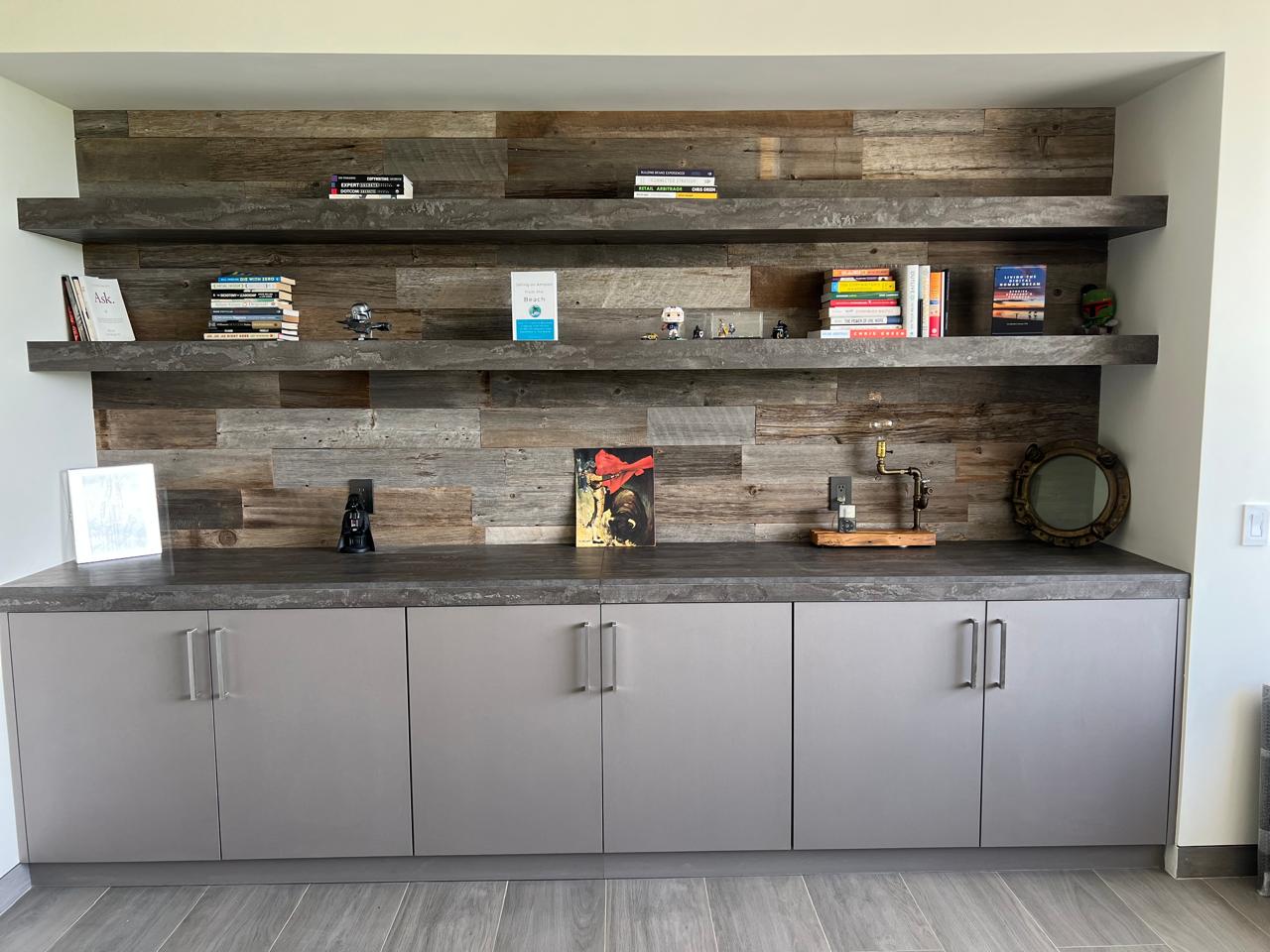 Home office with reclaimed barn wood accent wall behind desk, perfect Zoom video call background