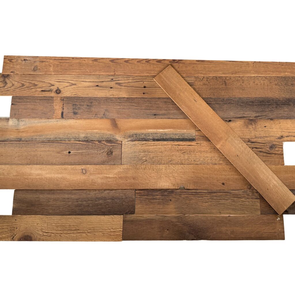 Milled brown reclaimed wood planks in random lengths