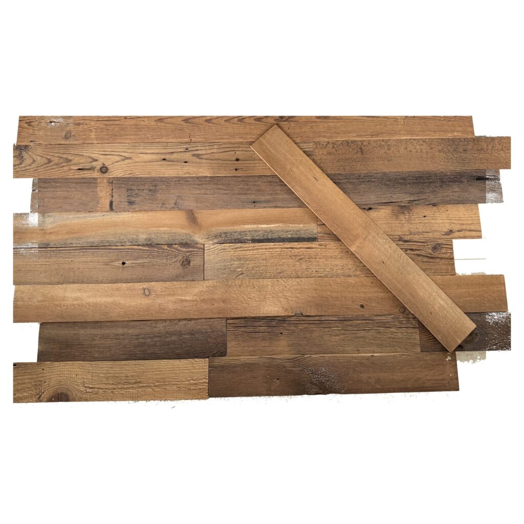 Random-length brown reclaimed wood planks laid out in a staggered pattern